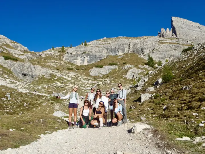 The group posing on a mountain pass